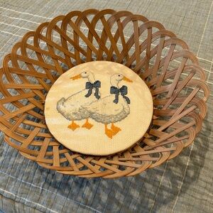 Vintage basket weave duck with blue ribbon.